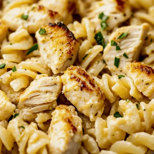 Welcome to a culinary adventure that will elevate your weeknight dinners to new heights! Today, we’re diving into a delightful recipe for Creamy Garlic Butter Chicken and Rotini in Parmesan Sauce. This dish is the epitome of comfort food, marrying the rich, savory flavors of garlic and butter with tender chicken and perfectly cooked rotini pasta. Not only does it satisfy your cravings, but it also brings warmth and joy to your dining table, making it perfect for both busy weeknights and special occasions.