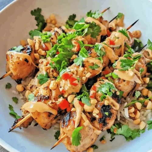 Thai cuisine is celebrated globally for its vibrant flavors and aromatic dishes. It harmoniously blends the sweet, sour, salty, and spicy elements that make each bite an explosion of taste. One dish that exemplifies this balance is the Easy Grilled Thai Chicken Skewers with Peanut Sauce. This dish not only highlights the essence of Thai cooking but also serves as a delightful option for both casual weeknight dinners and lively gatherings.